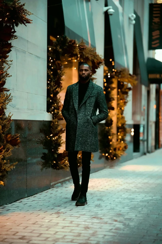 a man is standing in a street wearing a suit and tie