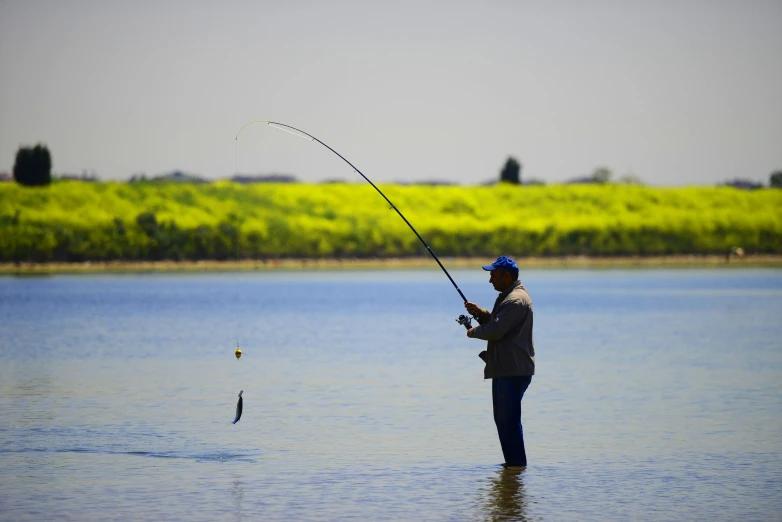 a person is fishing in the water