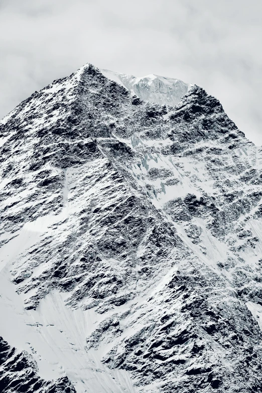 a large snowy mountain covered in very thick snow