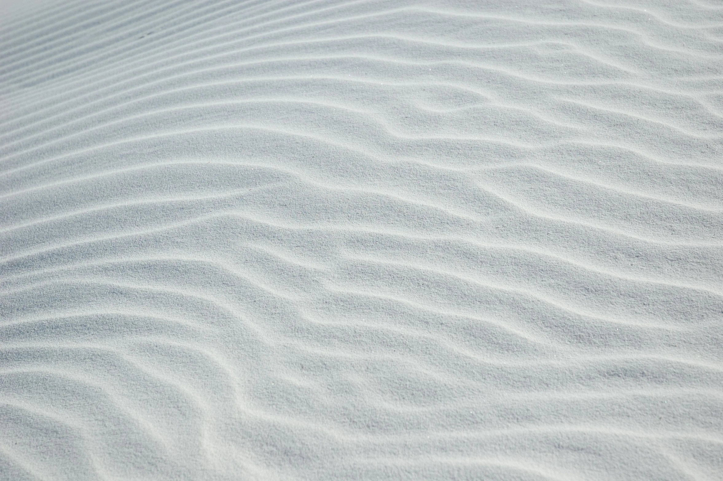 an image of ripples or waves on the sand