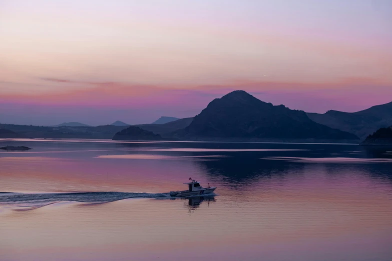 the person is on the water in the lake