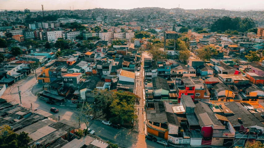 a large city with lots of rooftops and houses