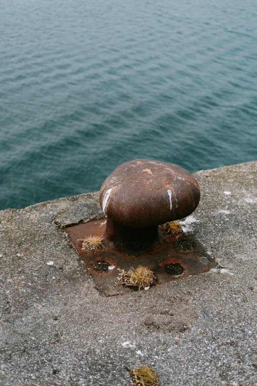 a big round thing sitting on the concrete