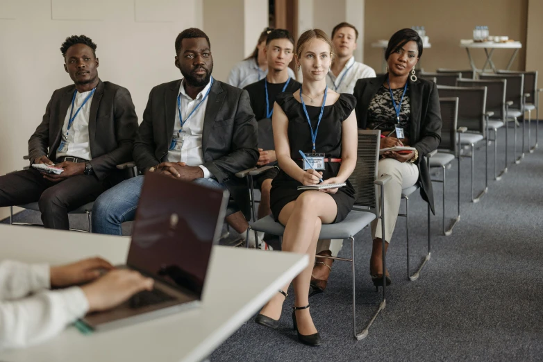 a group of people at an office meeting