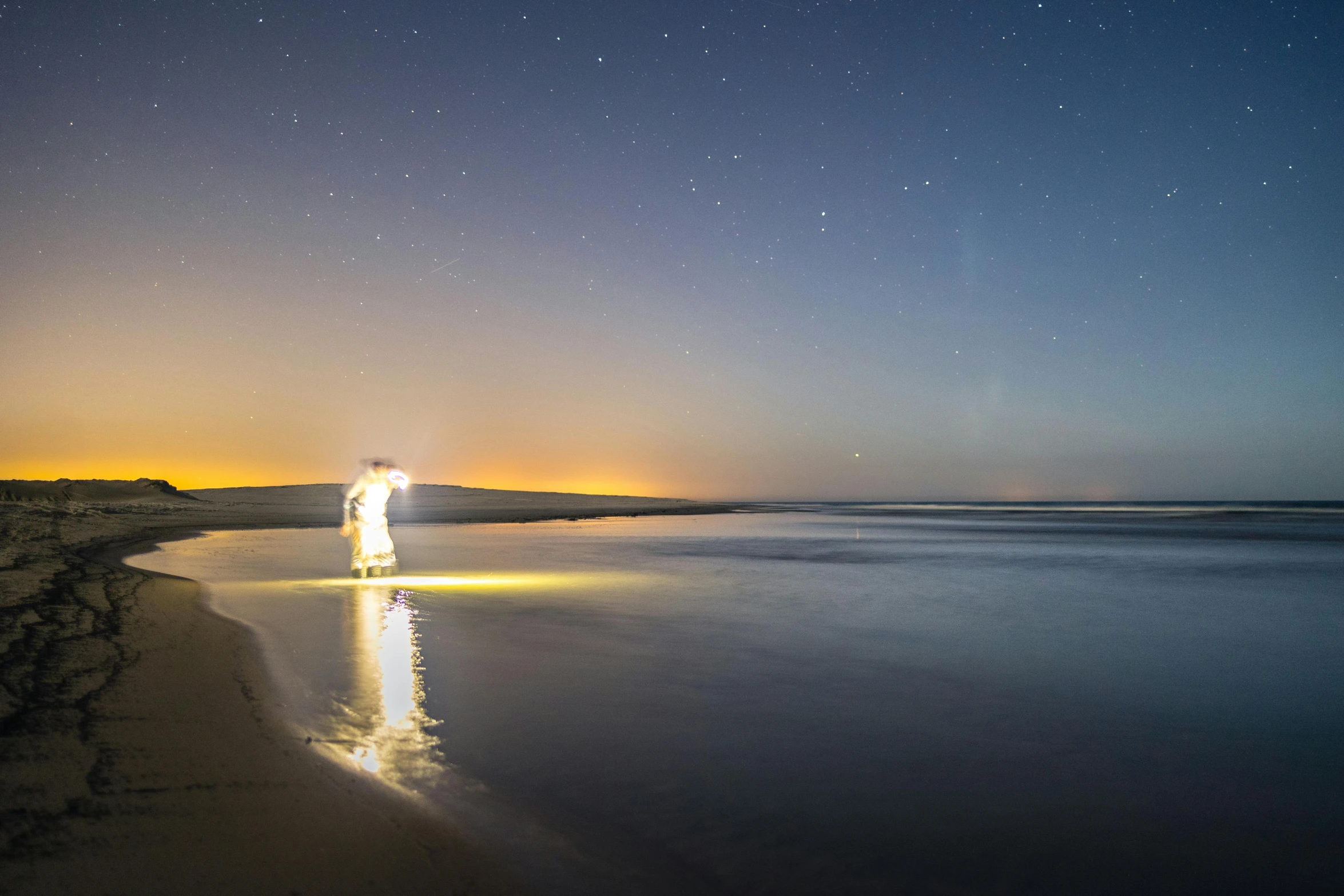 an night view of a dark sea at night