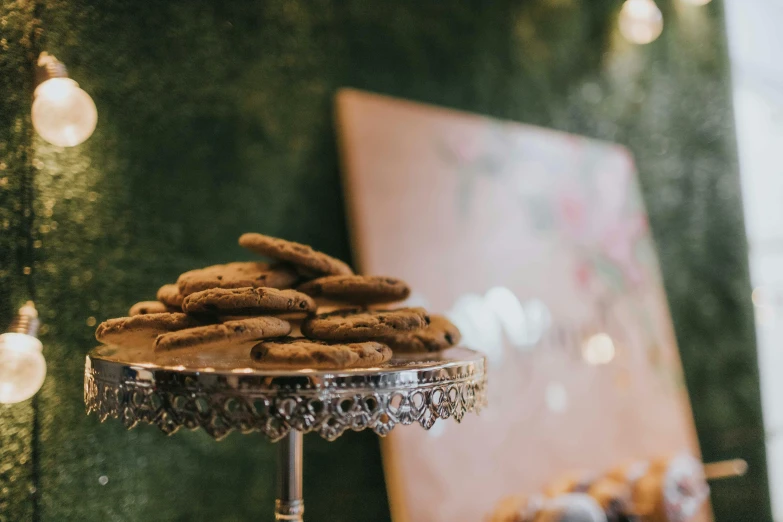 a table filled with cookies in a display