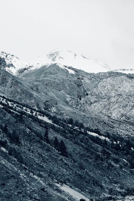 mountains are in the background in black and white