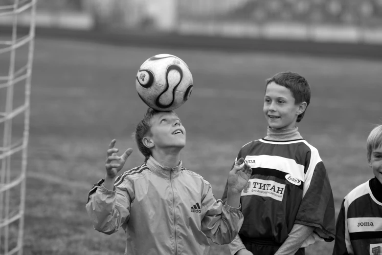 three s play a game of soccer