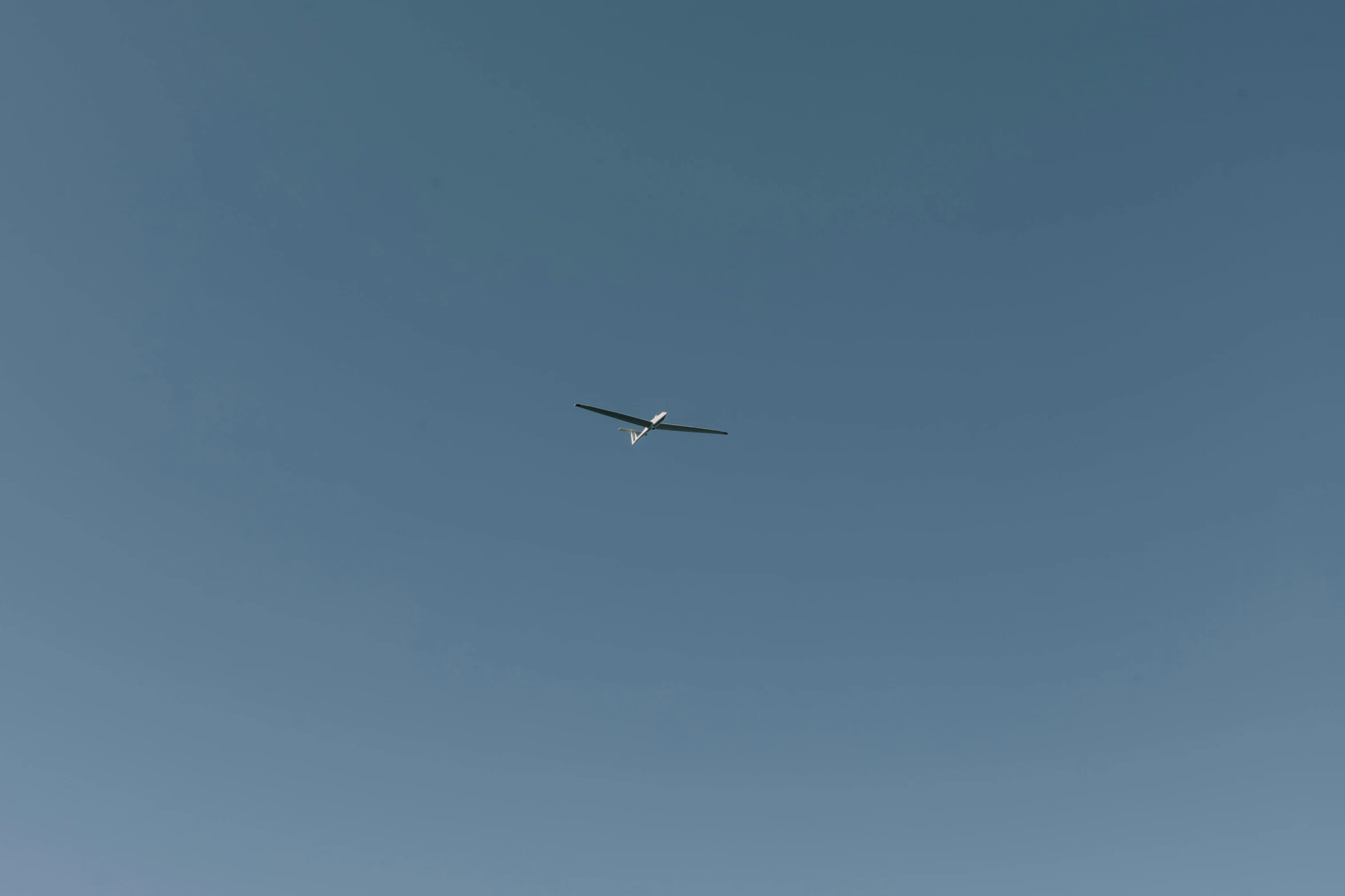 a large passenger airplane flying in the sky