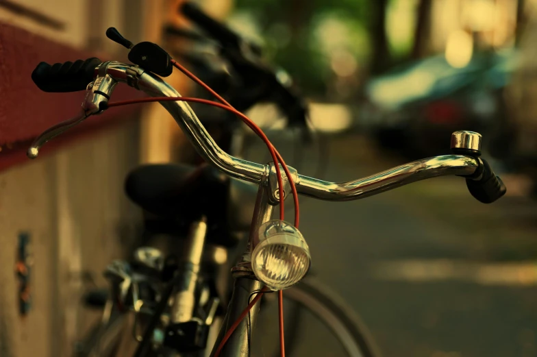 the handlebars on a parked bike are red