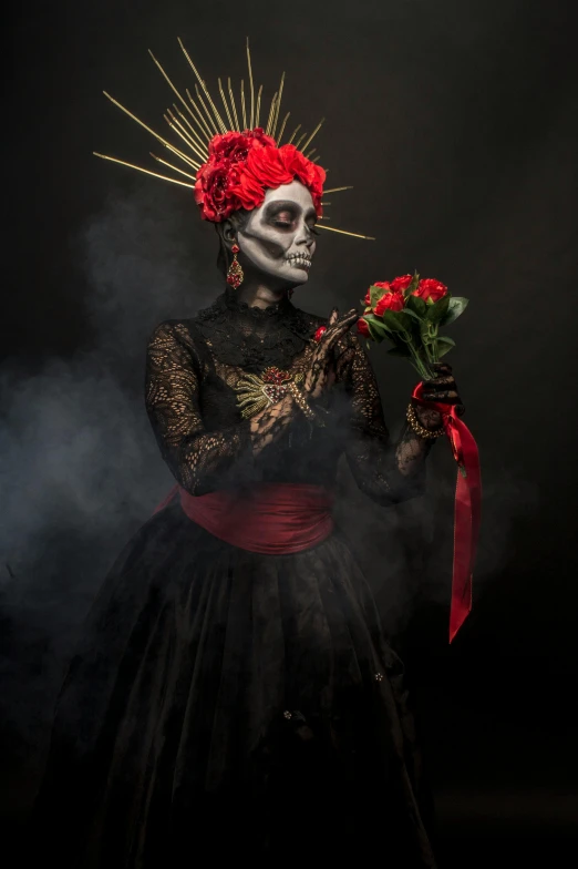 a woman with red hair and skeleton makeup holding flowers