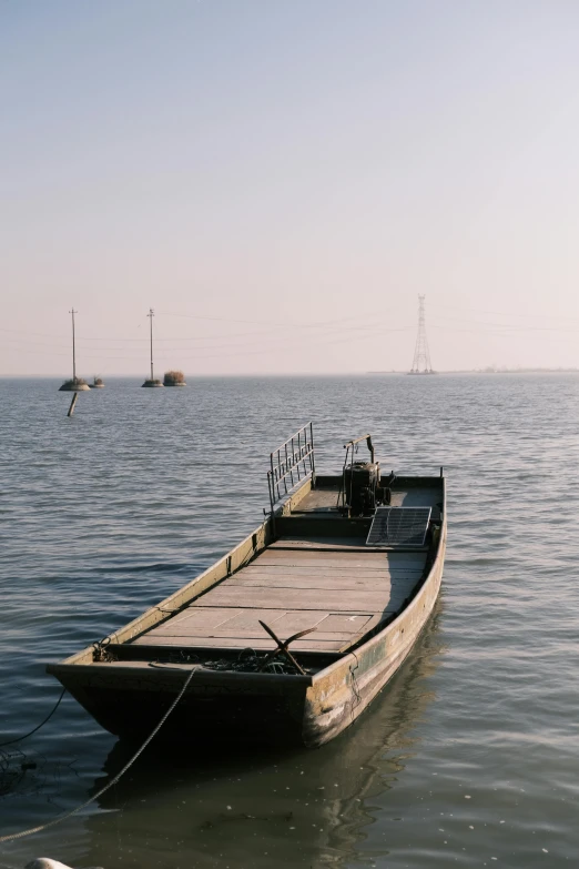 a large boat sitting on top of a body of water