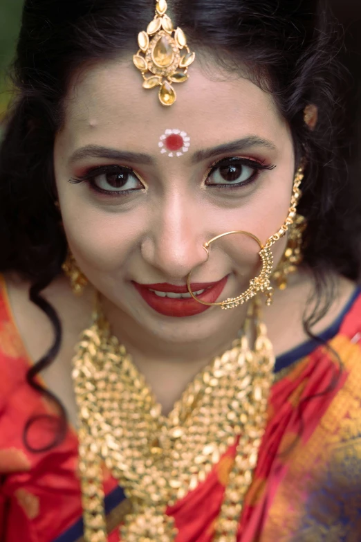 closeup view of a young indian woman with a nose ring