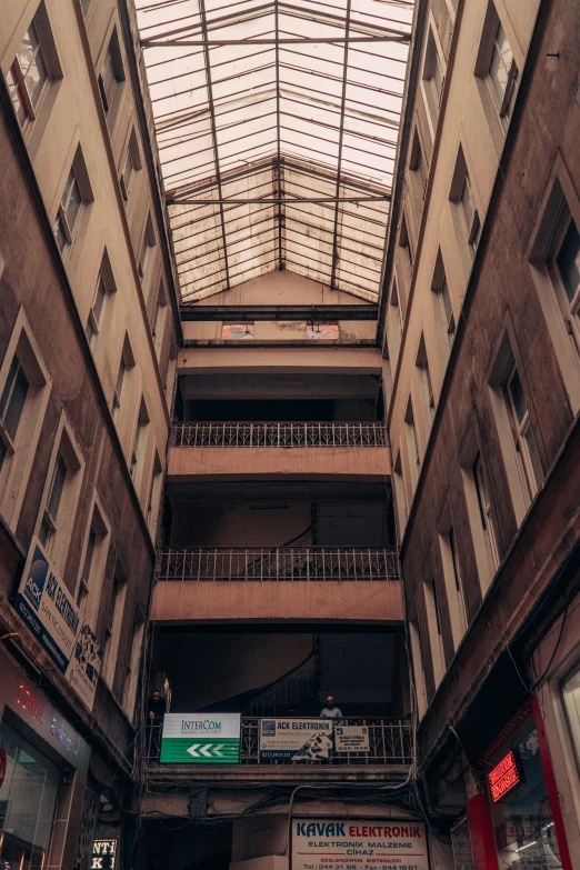 an old shopping center has a skylight over it