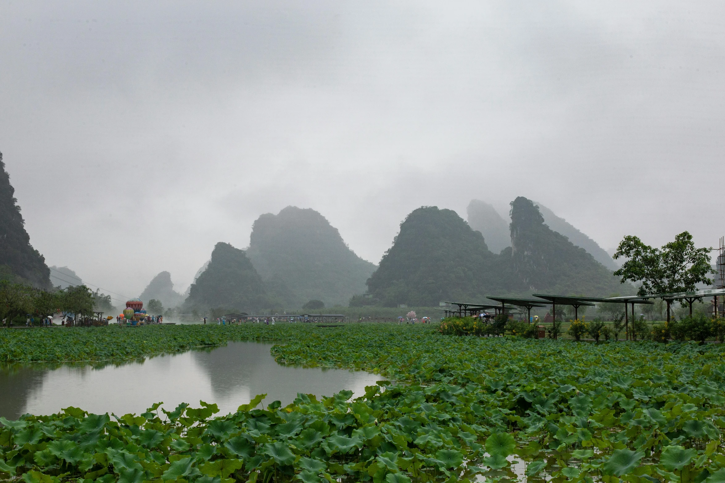 the view from across the water of some mountains