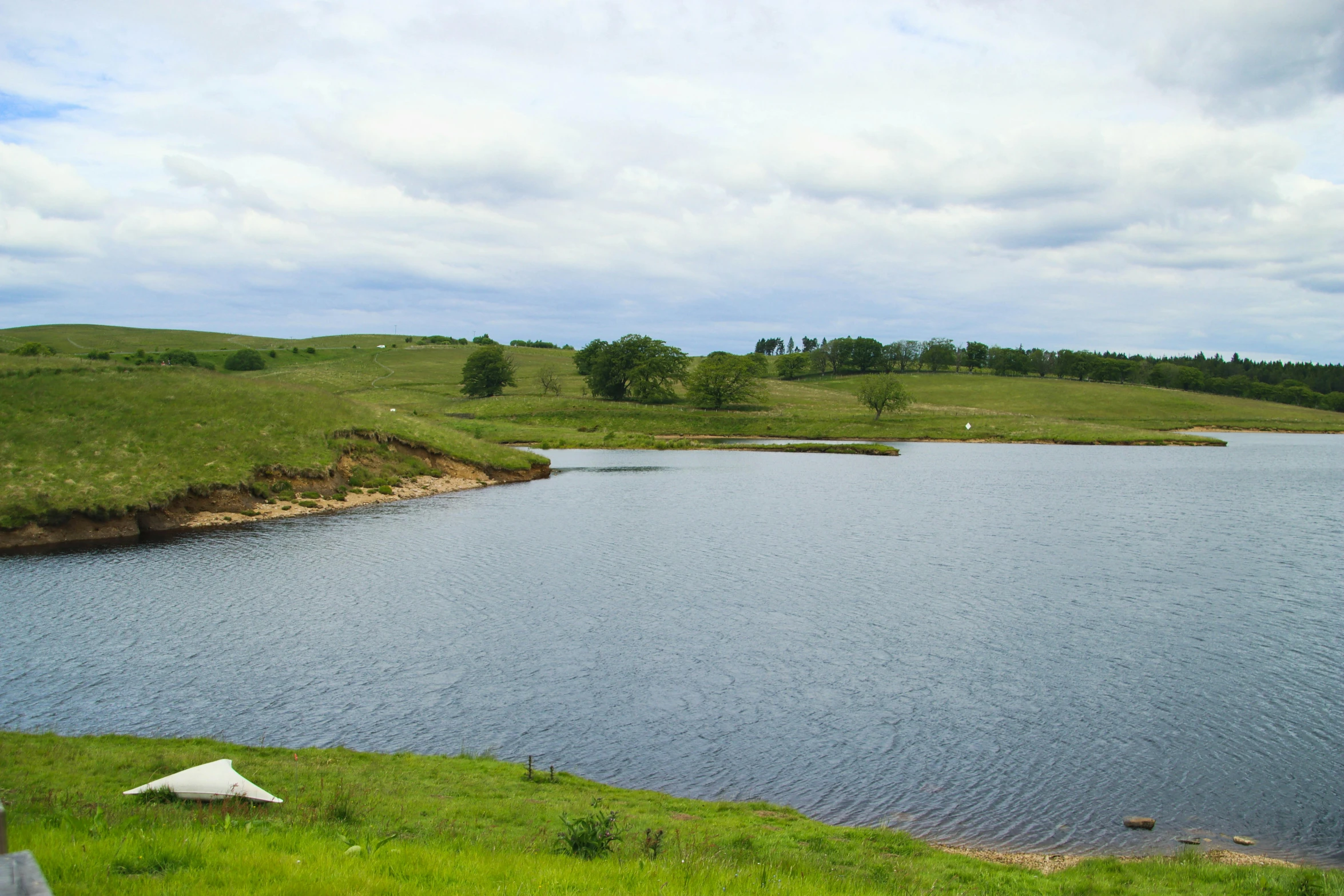 a scenic view of the lake in the middle of nowhere