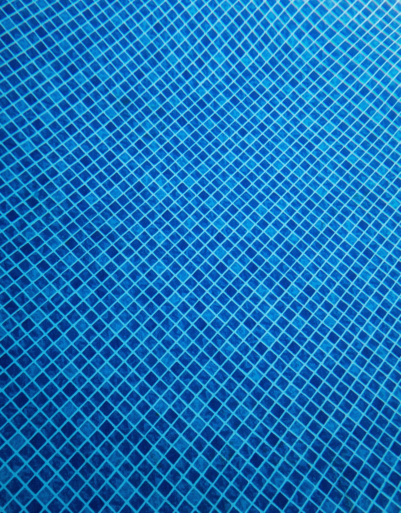 a blue water has been distorted to it's surface