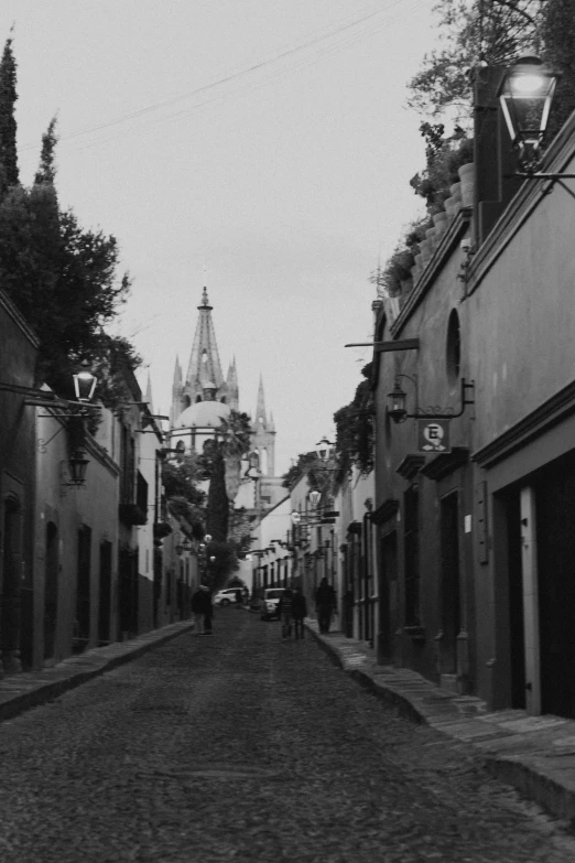 black and white image of a small city with buildings