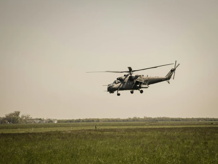 an air plane is flying low in the sky