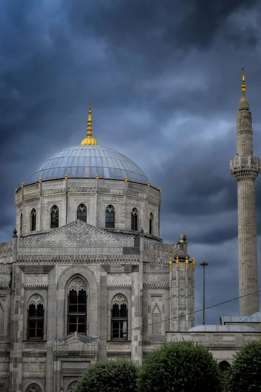 large building with two yellow and blue domes on top