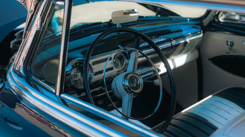 the interior of a car is shiny and chrome