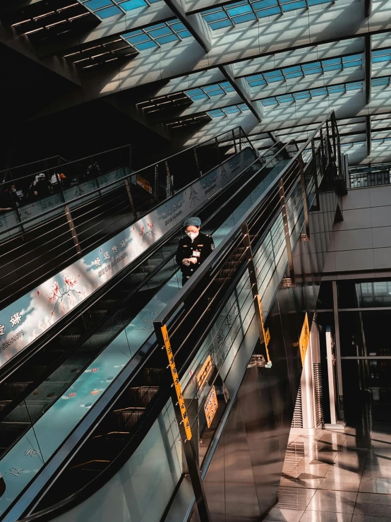 people are walking around and inside a busy train station