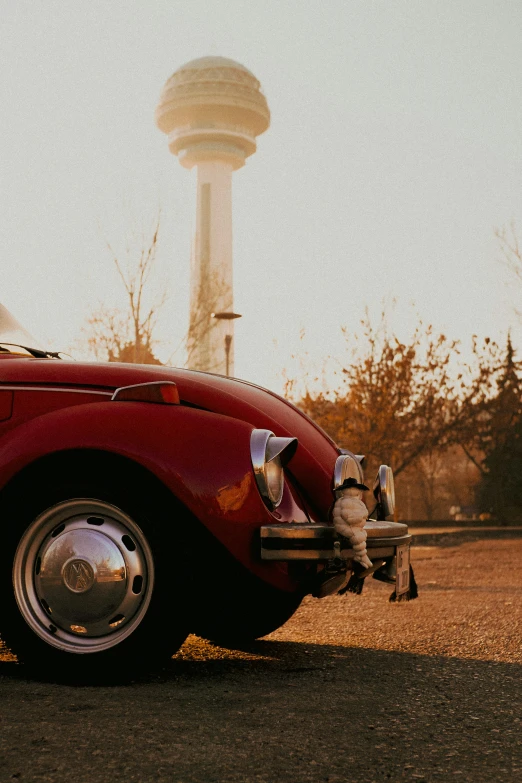 a close up of an old red sports car