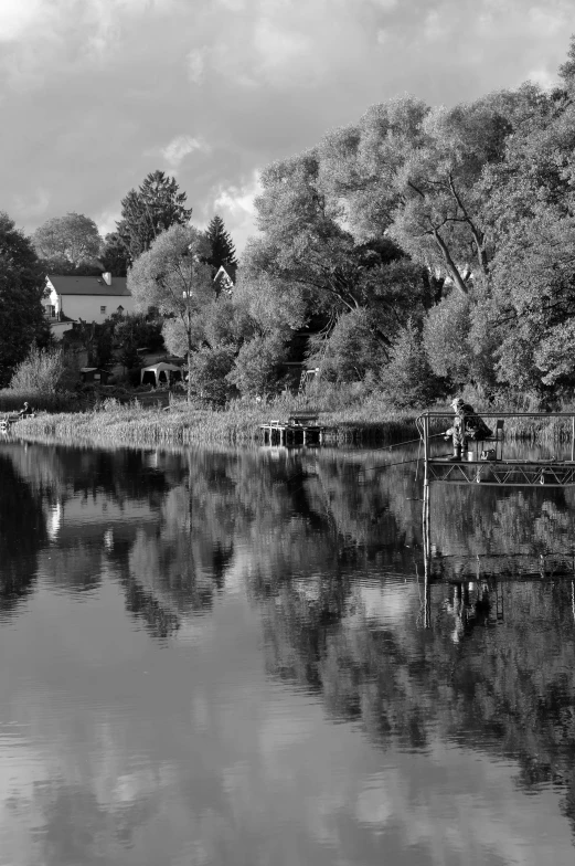 the po shows a view of a river that is surrounded by green trees