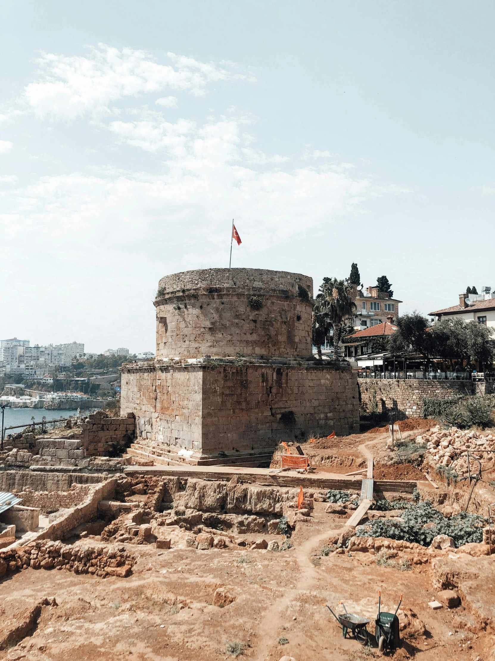 a small tower is located on top of a cliff