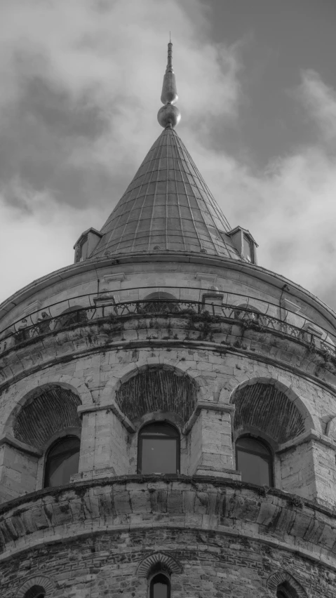 a very old looking building has a steeple