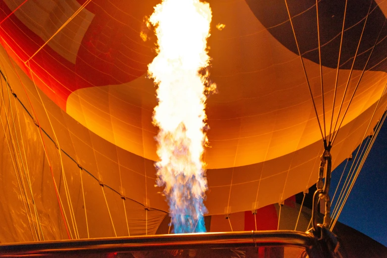 fire is lit inside a large air balloon