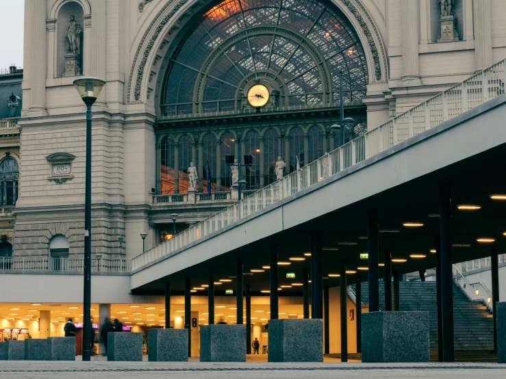 the front view of a train station at night