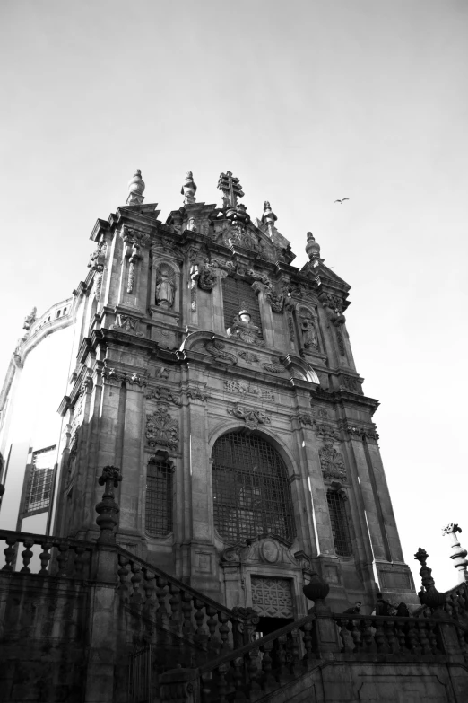 the black and white image shows a large cathedral