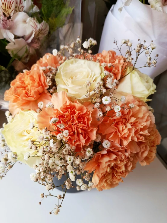 the flowers on the table are arranged into an arrangement