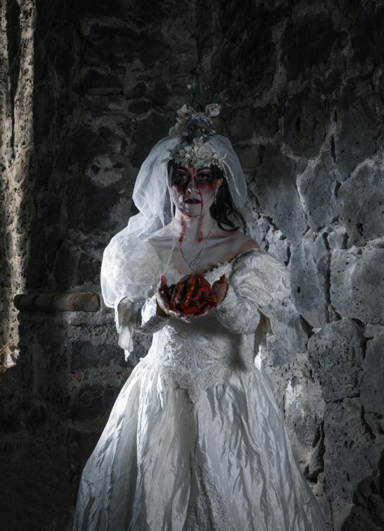 a woman wearing a very strange wedding gown