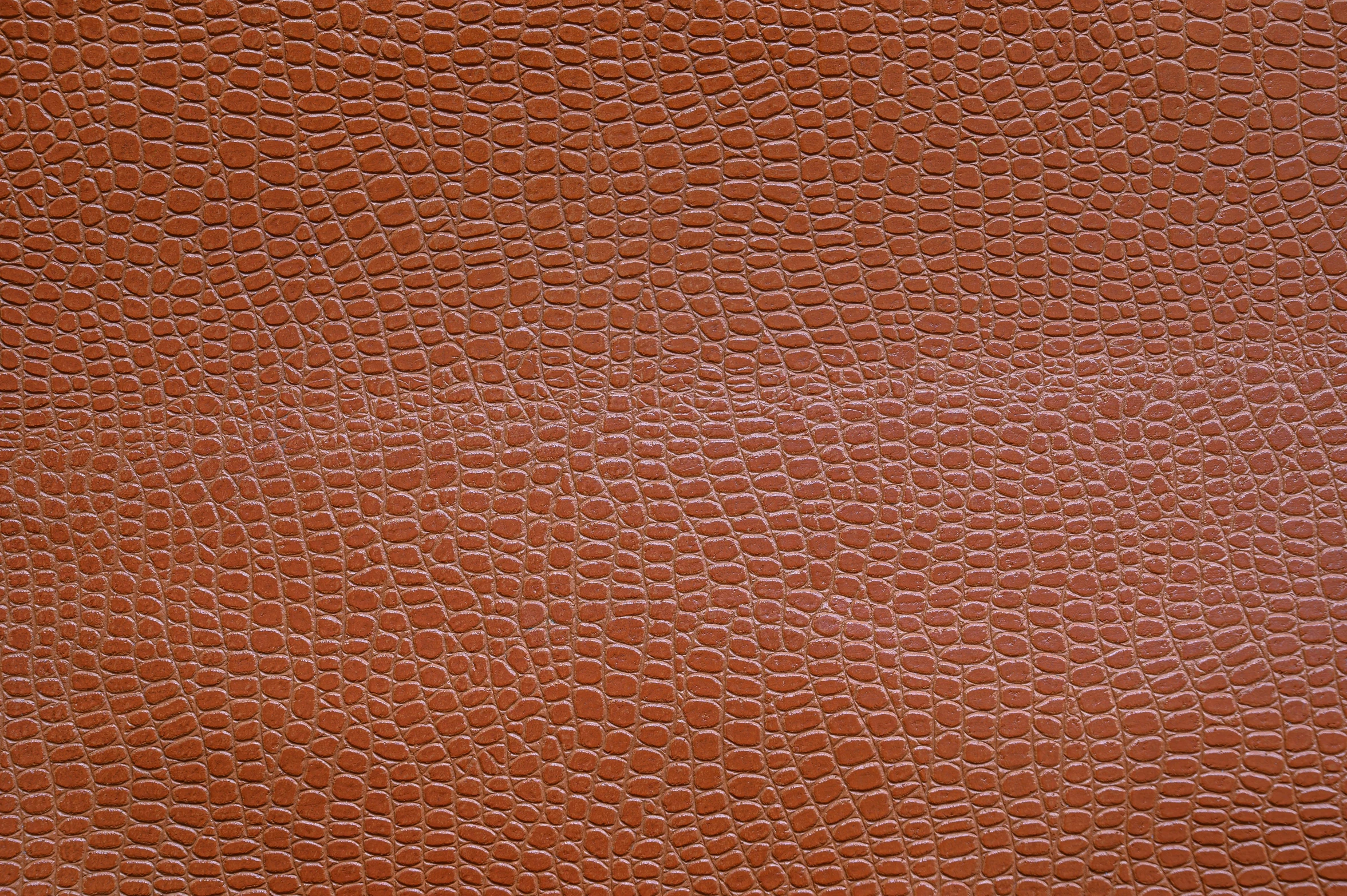 closeup of a leather material with a small amount of white dots on it