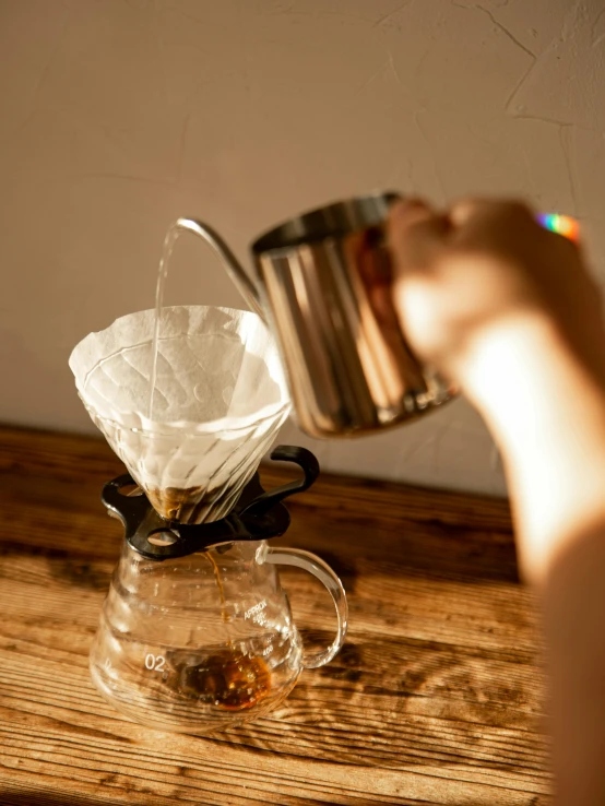 a woman putting paper in a cup