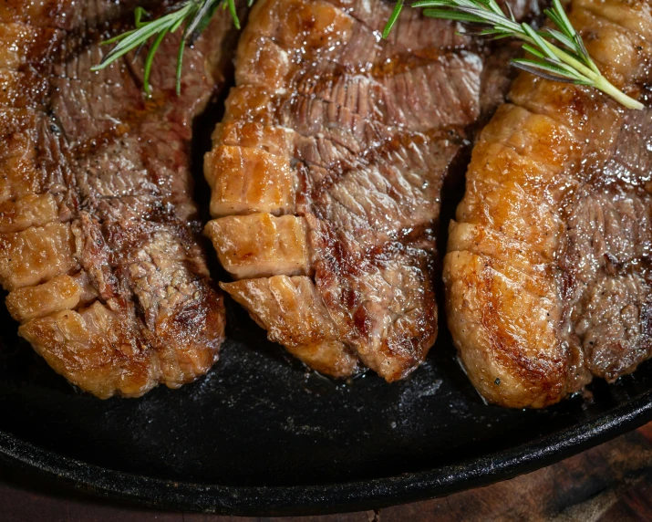 steak is being cooked in the set on the table