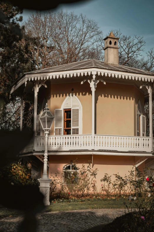 an old house with ornate porches and balconies