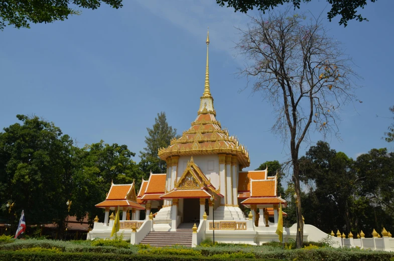this is a temple in thailand with orange roof tiles