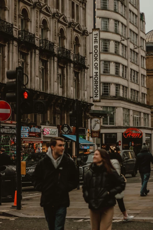 a group of people walking down a street