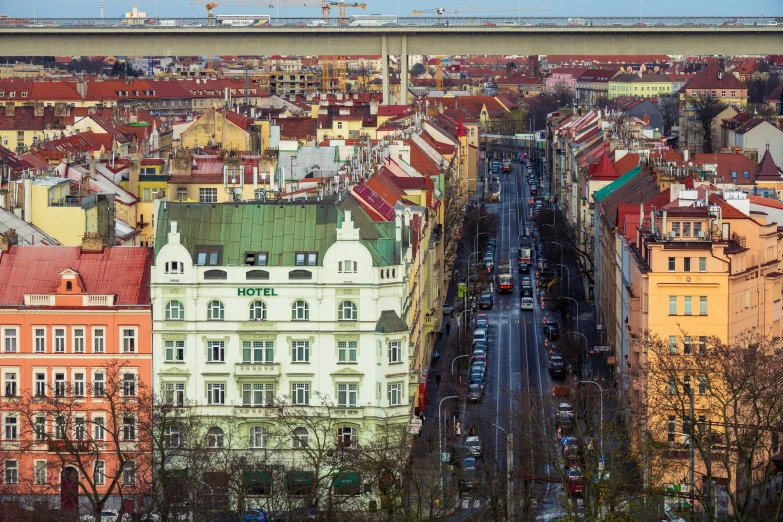 there is a large number of buildings with cars on the street