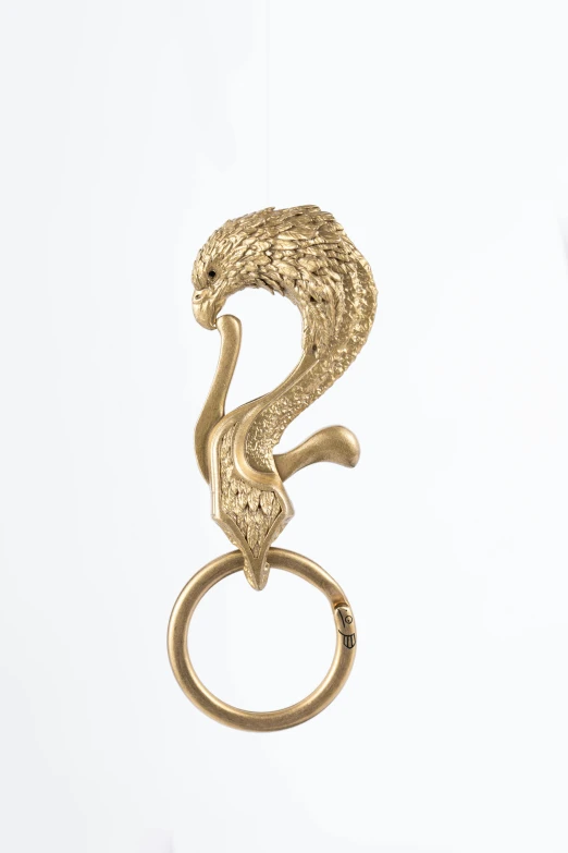 a gold ring with an animal design on it
