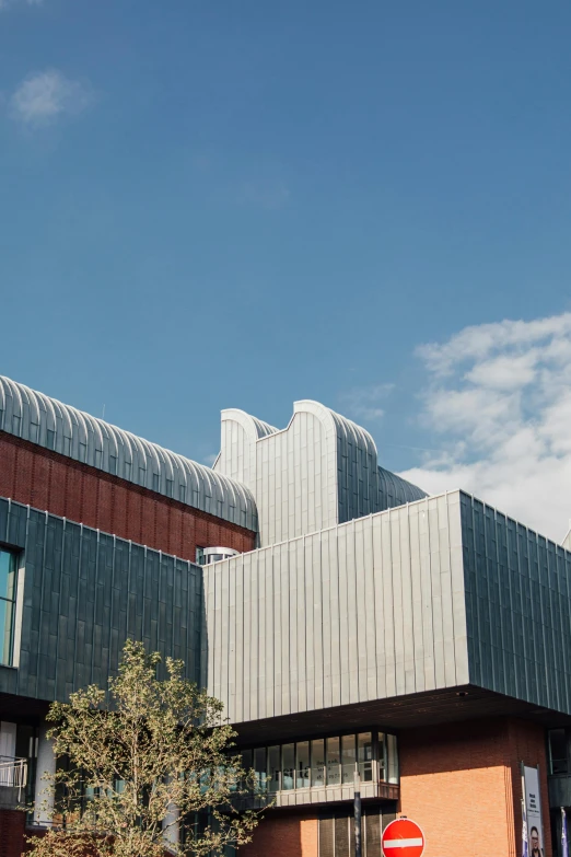 an industrial building has a roof shaped like a structure