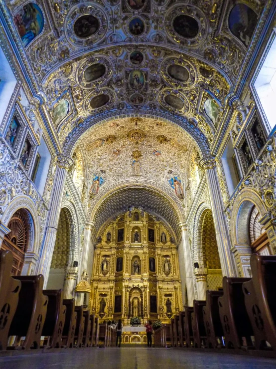 an ornate cathedral with ornate white and gold