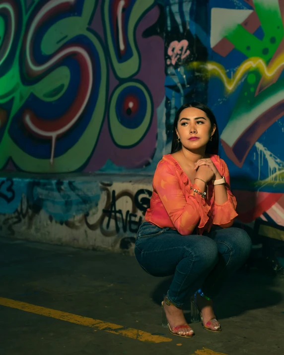 a girl posing with her hands crossed in front of her