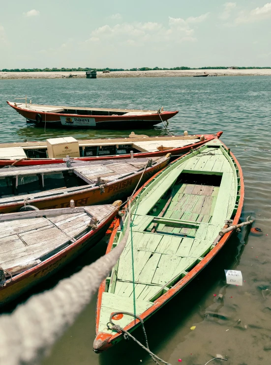 a number of boats sitting near one another