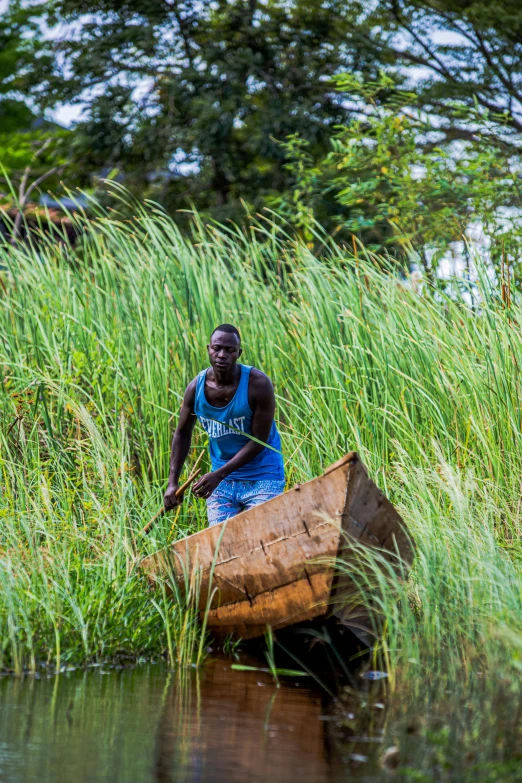 a person sits in a boat filled with water