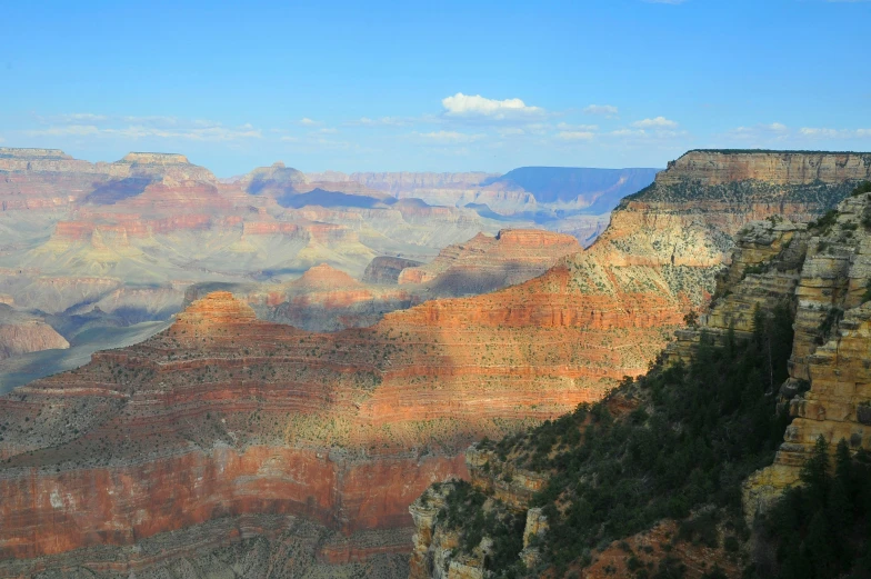 a canyon with large cliffs filled with rocky terrain