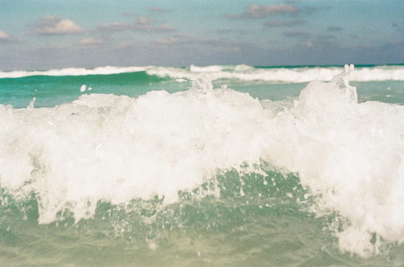 a surfer is riding the waves in the ocean